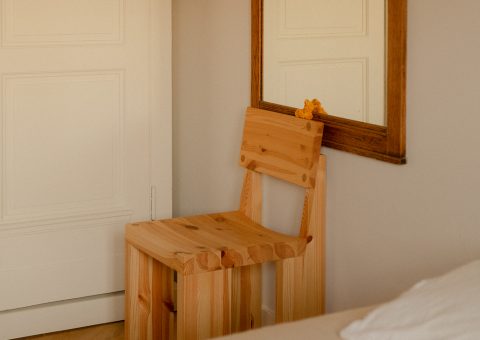 Pine chair in bedroom