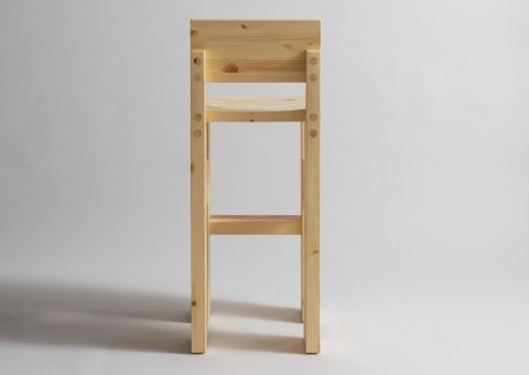 Pine bar stool from the back