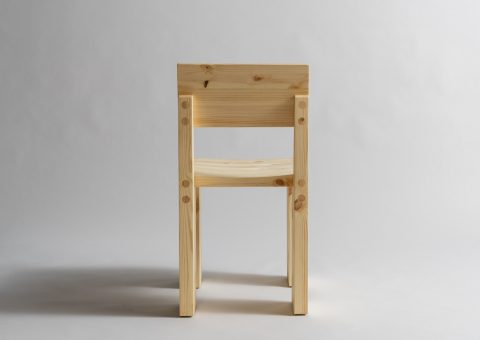 Wooden dining chair from the back